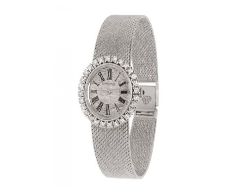 LONGINES ladies' watch, 1970s.In 18kt white gold. Oval case with satin-finished dial engraved in the shape of waters. Baton t
