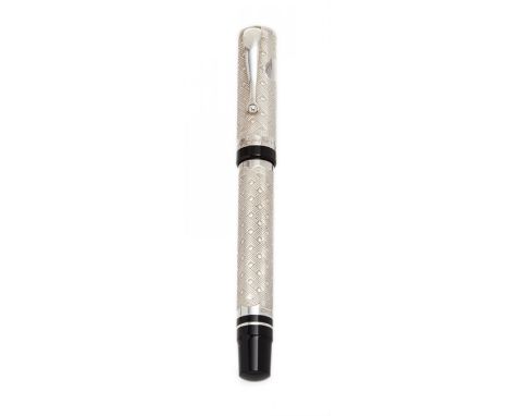 MONTEGRAPPA FOUNTAIN PEN "COSMOPOLITAN AFRICA", 1997.Embossed silver barrel and black resin.Limited edition of 500.Two-tone g