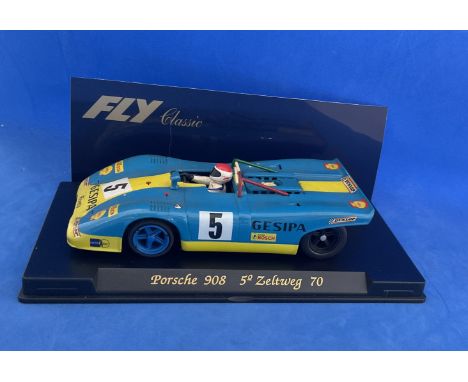 Model Car Porsche 908 Martini Zeltwey 70 blue race car in display case. Measures 5 inches appx. Good condition. We combine po