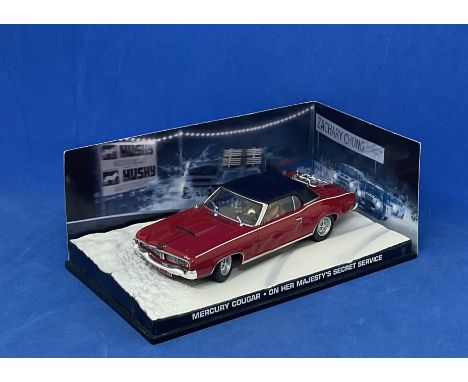 Model Car 007 Eaglemoss James Bond Mercury Cougar On Her Majesty`s Secret Service 1/43 scale red model car with drivers in di