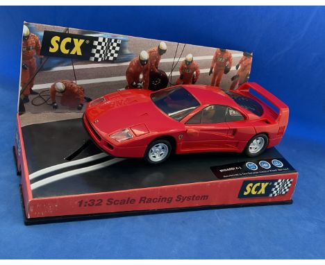 Scalextric Minardi F1 red race car with drivers 1.32 scale in display case. Measures 5 inches appx. Good condition. We combin