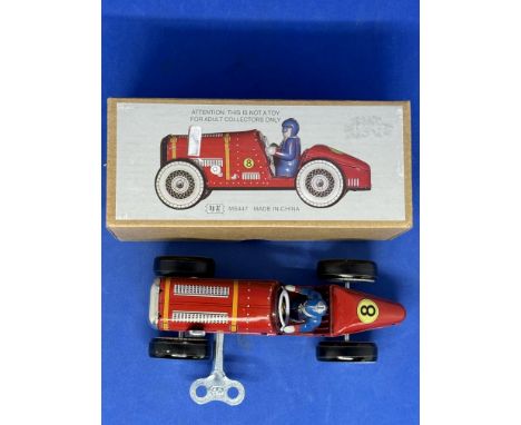 Clockwork Tin Toy Racing Car MS 447. In Original Box. Good Condition. We combine postage on multiple winning lots and can shi
