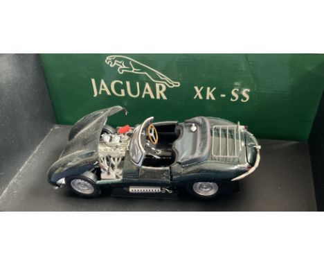Jaguar XK-SS Autoart 1:18 Steve McQueen 1956 Model Car. Autoart is known for their superb versions of Jaguar cars. One of Ste
