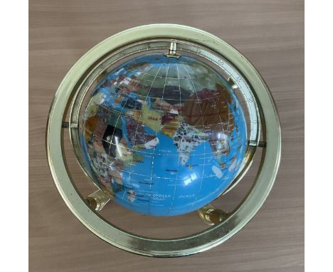 vintage Table top Globe with compass and metal base. 39 inches circumference appx, 15 inches in height appx. Good condition. 