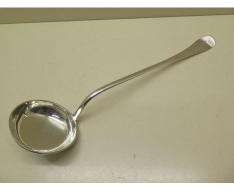 A silver ladle Birmingham maker M&amp;C - length 37cm - engraved - approx weight 6.5 troy oz - good condition 