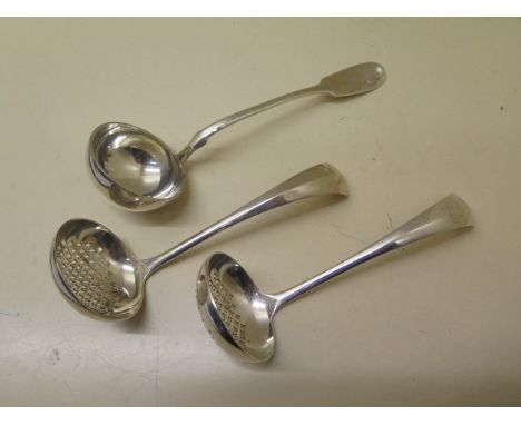 A pair of Continental silver sifter spoons - Length 16cm and a Continental silver ladle - Length 20cm - engraving to ladle, a