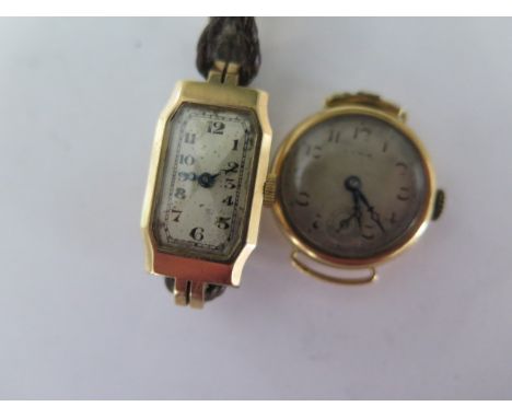 A 9ct yellow gold manual wind ladies wristwatch on a leather strap - running - total weight approx 12 grams and a 18ct watch 