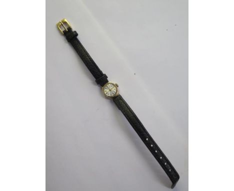 A 9ct yellow gold manual wind ladies watch - 13mm case - total weight approx 7 grams 