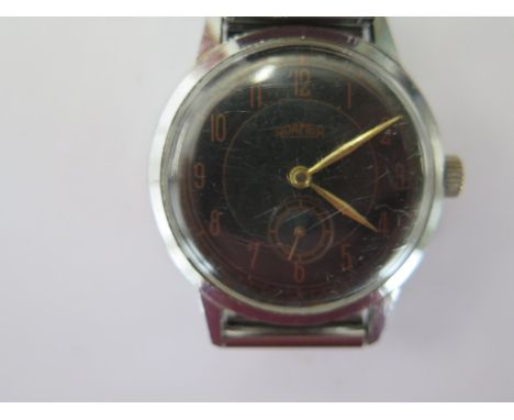 A Roamer manual wind gents wristwatch with black dial - 35mm case - on a sprung strap - running with spare links 