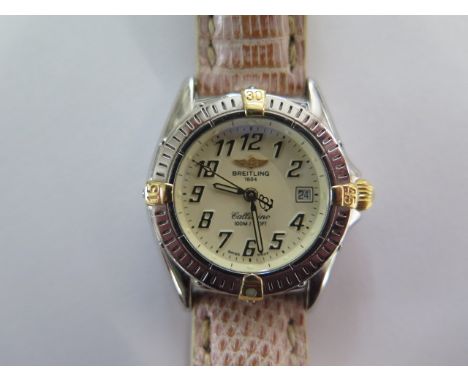 A ladies Breitling Callistino quartz watch with date, 25mm rotating bezel, ref B52345 on a leather Breitling strap - no box o