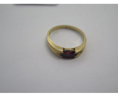 A yellow gold Ruby ring size L/M - approx weight 2.8 grams - surface tests to approx 9ct - good condition 