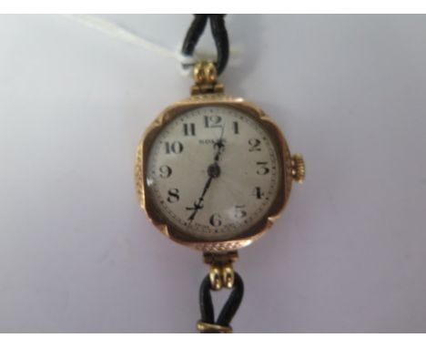 A 9ct yellow gold Rolex manual wind ladies wristwatch on a leather strap - 24mm case - not running - approx total weight 16 g