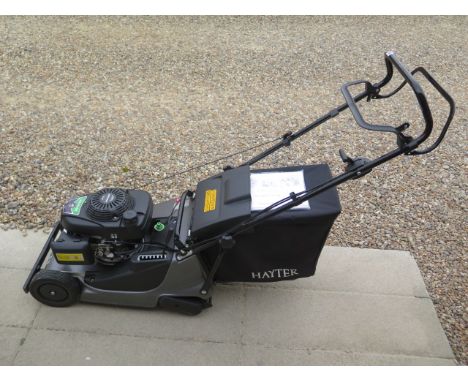 A Hayter Harrier 41 Pro self propelled petrol lawnmower 16 inch cut with Honda engine , runs well bought in 2017 . Comparable