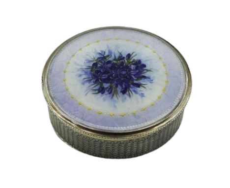 Swiss silver and enamel box and cover, of circular form, the body with engine turned decoration, the removable enamelled cove