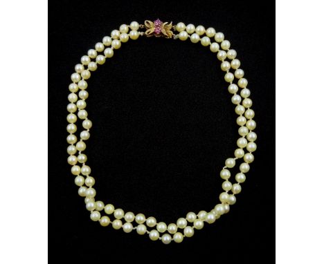 Double strand cultured pearl necklace, with 9ct gold ruby clasp, which is detachable to form two single strands