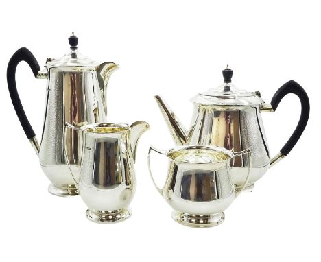 1940's silver four piece tea service, comprising teapot, hot water pot, milk jug, and twin handled open sucrier, each of plai