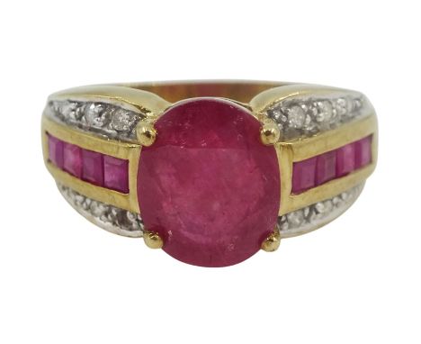 9ct gold oval ruby ring, with channel set, calibre cut ruby and diamond chip shoulders, hallmarked