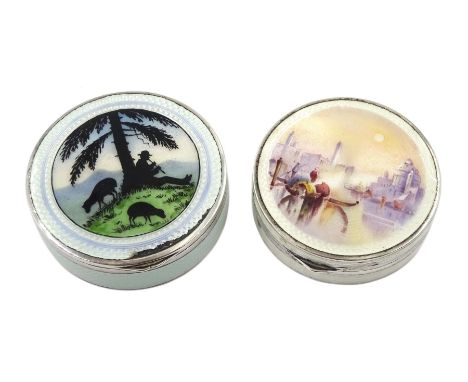 Silver enamel circular compact, the lid decorated with a silhouette of a Shepherd playing a recorder and sheep by Cohen &amp;