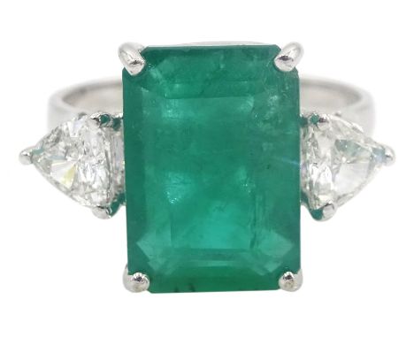 White gold three stone large emerald and trillion cut diamond ring, stamped 18K, emerald approx 3.50 carat, total diamond wei