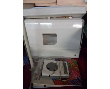 An Elna 7000 computer electric sewing machine with original hard inner cover and soft outer cover - with instruction manual, 