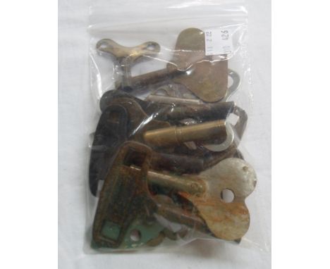 A bag containing a quantity of vintage clock keys