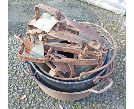 Three old cast iron and enamel cooking pots - sold with an old cast iron glue pot (insert missing) and a quantity of old gin 