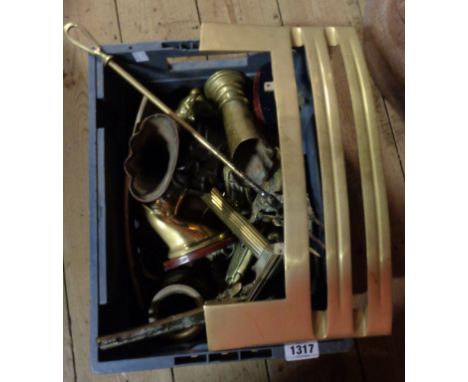 A crate containing a quantity of brassware and other metalware including pair of ecclesiastical candlestick holders, etc.