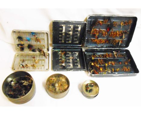 Two vintage Shakespeare Norris fly cases, a small aluminium fly case and three small glazed top tins containing assorted trou