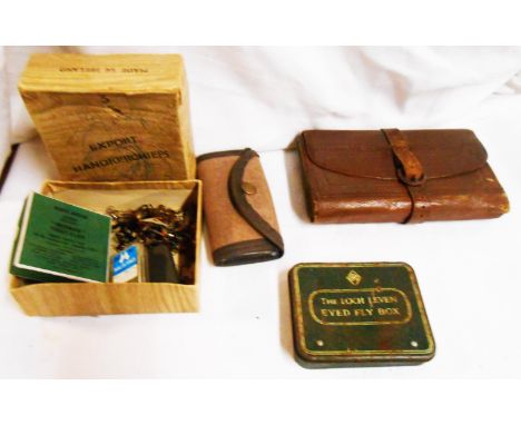 A vintage leather fly wallet with part line mounted fly contents - sold with a card box with flies and other items