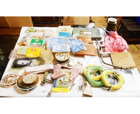 A quantity of fishing collectables including two fly tying clamps and part clamp, prepared casting line hooks, some flies, tr