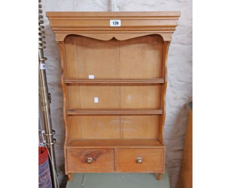 A 47cm modern pine wall mounted spice rack with two drawers under
