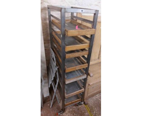 A 37cm wide stainless steel professional patisserie/bread trolley with seven wooden framed and perforated metal trays, set on