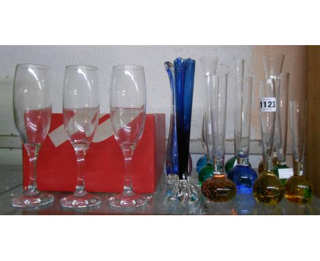 Ten vintage glass bud vases with globe controlled bubble coloured bases and tall clear stems - sold with another similar bud 