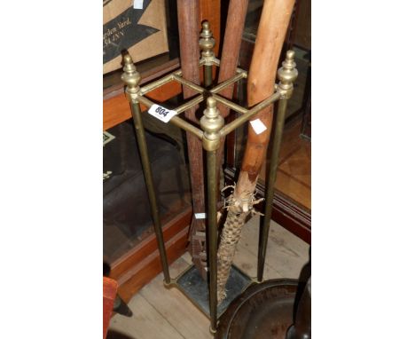 A brass cage framed stick stand