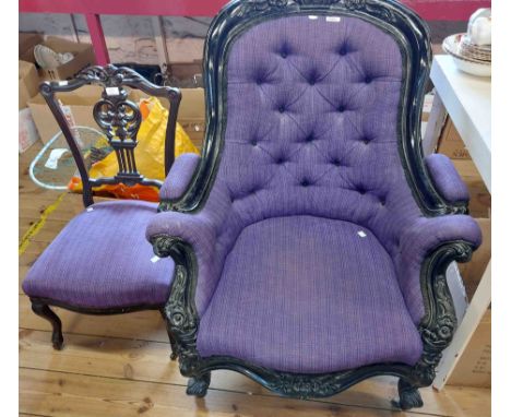 A Victorian later ebonised part show frame drawing room armchair with purple button back upholstery, set on cabriole front le