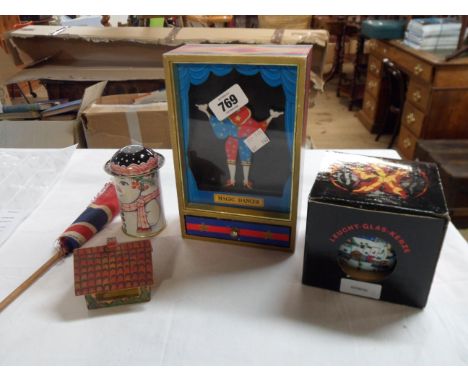 A 1970's Japanese magic dancer music box for automaton - sold with a handheld Union flag, a carved wood matchbox holder, etc.