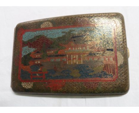 An old cloisonne decorated brass cigarette case