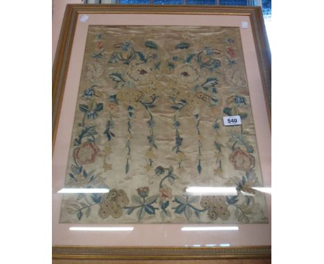 A framed and glazed antique stumpwork embroidered panel - framed at later date