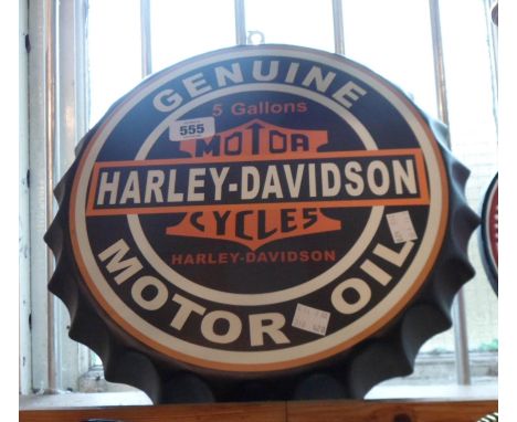 A modern printed tin Harley Davidson Motorcycle sign in the form of a bottle top