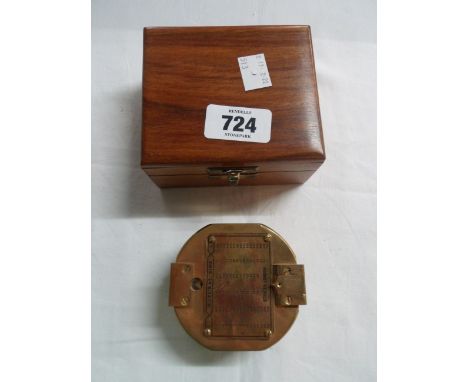 A modern reproduction brass compass in wooden case