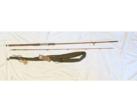 An 8' 3" vintage Hardy's Palakona 'The Marksman' two section split cane float fishing rod - wear to cork, butt section guide 