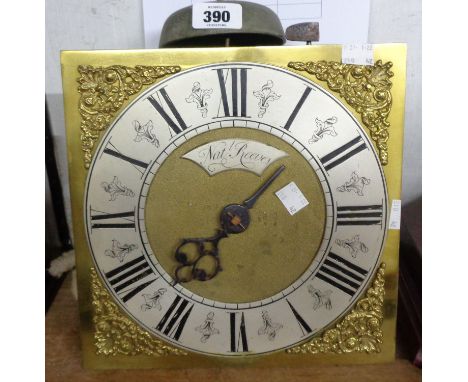 An antique brass and iron framed thirty hour bell striking longcase clock movement with later 25.5cm square brass dial marked