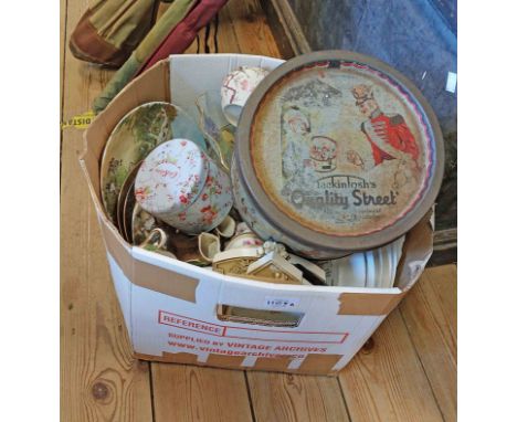 A box containing a quantity of glassware and other items including an old Quality Street tin containing a vintage straw hat w