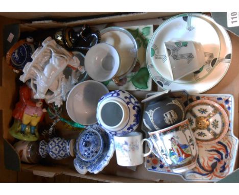 A box containing a quantity of ceramic items