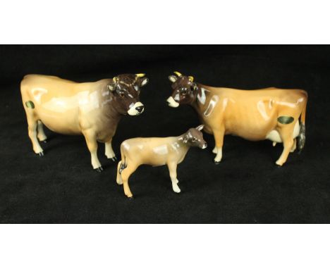 A Beswick Jersey cattle family
Comprising bull Champion Dunsley Coy Boy model 1422, together with Jersey cow Champion Newton 