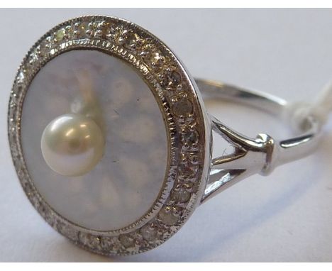 An 18 carat white gold pearl, mother of pearl and diamond Ring 