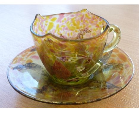 Emile Galle (1846-1904) Nancy, amber coloured glass Cup and Saucer, the Cup with trailing handle and beautiful enamelling of 