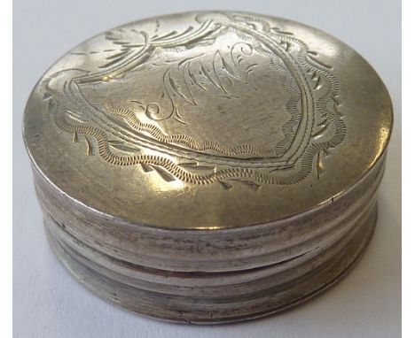 A small late-18th century circular hallmarked silver Patch Box, the circular over with shield-shaped cartouche and bright-cut