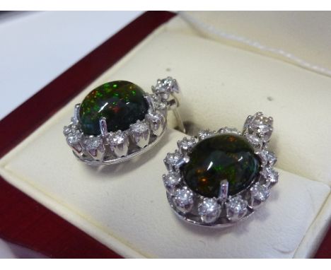 A pair of 18-carat gold, black opal and diamond Cluster Earrings 