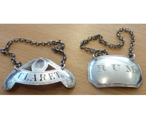 A 19th century hallmarked silver Spirit Label "RUM" together with a Scottish silver Wine Label "CLARET", makers mark of Macka